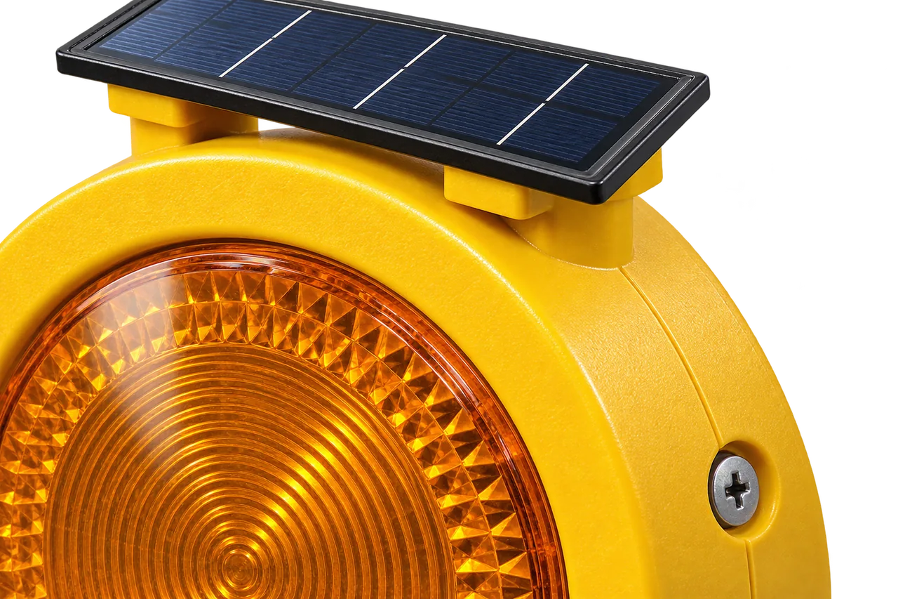 Solar & AC warning lamps — Macro detail — optical lens, body texture, screw and solar panel